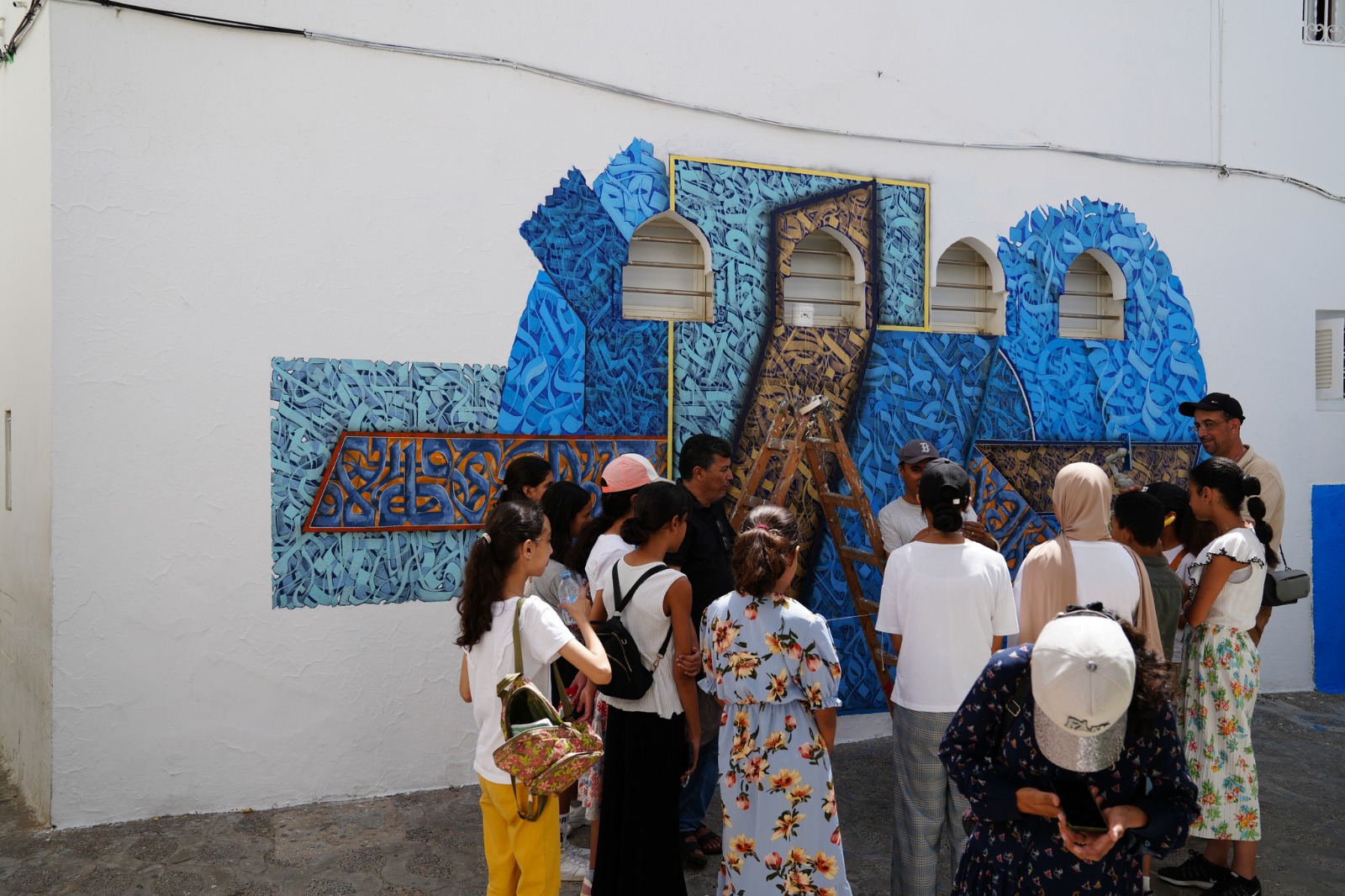 من جداريات دورة موسم  أصيلة الثقافي الدولي الـ 45