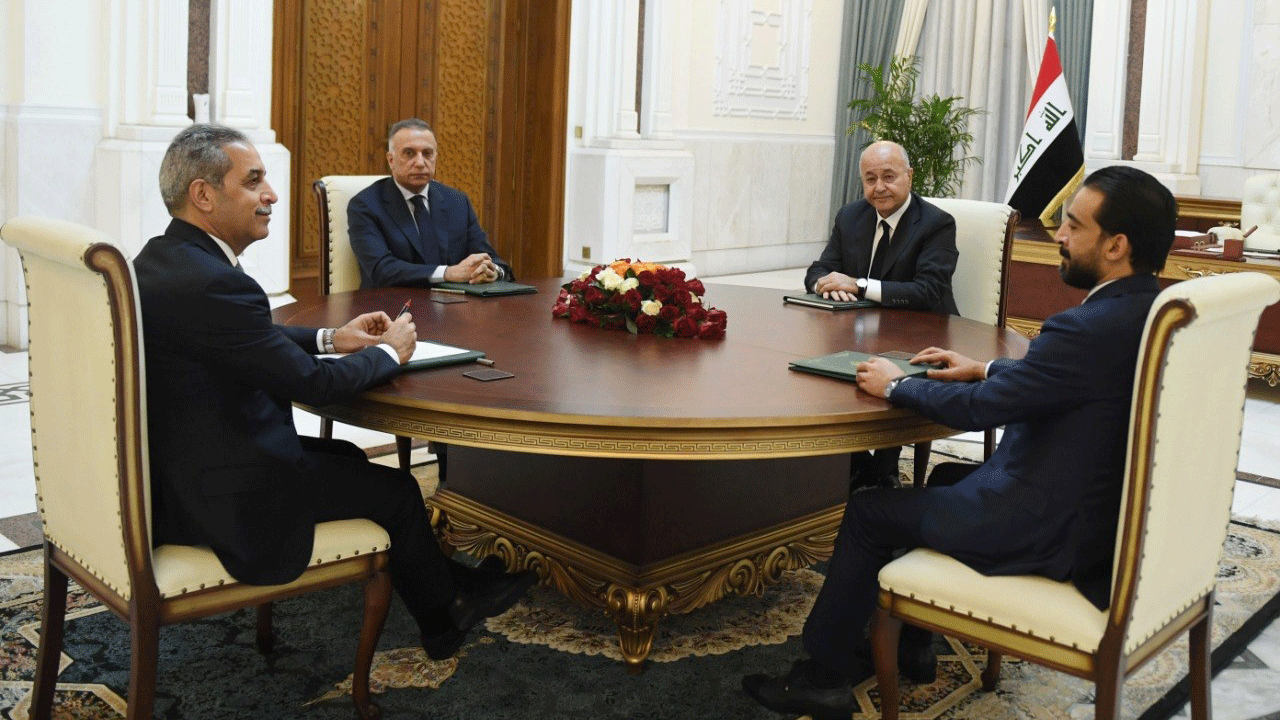 الرؤساء العراقيون الاربعة خلال اجتماعهم الاحد