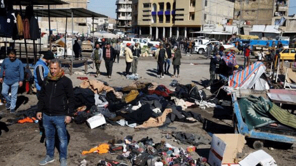 آثار التفجير المزدوج الذي ضرب بغداد الخميس وادى الى مقتل واصابة 142 مواطنا