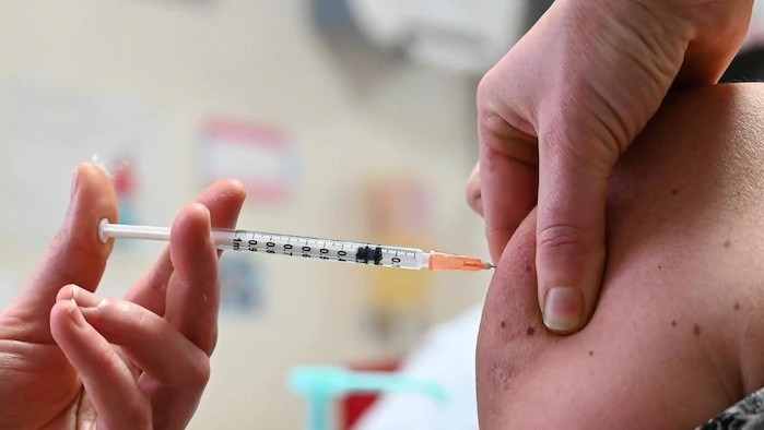 تسارع حملات تطعيم لقاح كورونا في بريطانيا - أرشيف (أ ف ب) 