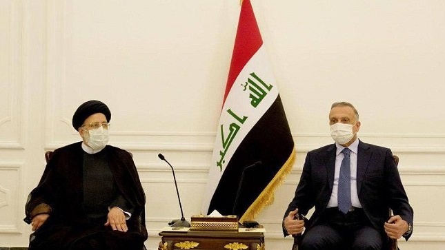 الكاظمي ملتقيا رئيسي خلال زيارة سابقة له الى بغداد