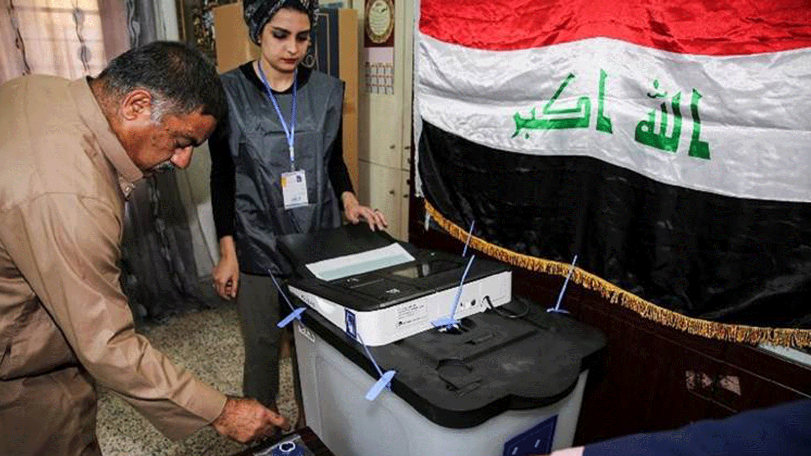 عراقي يشارك بانتخابات 2018 في حي الكرادة بغداد