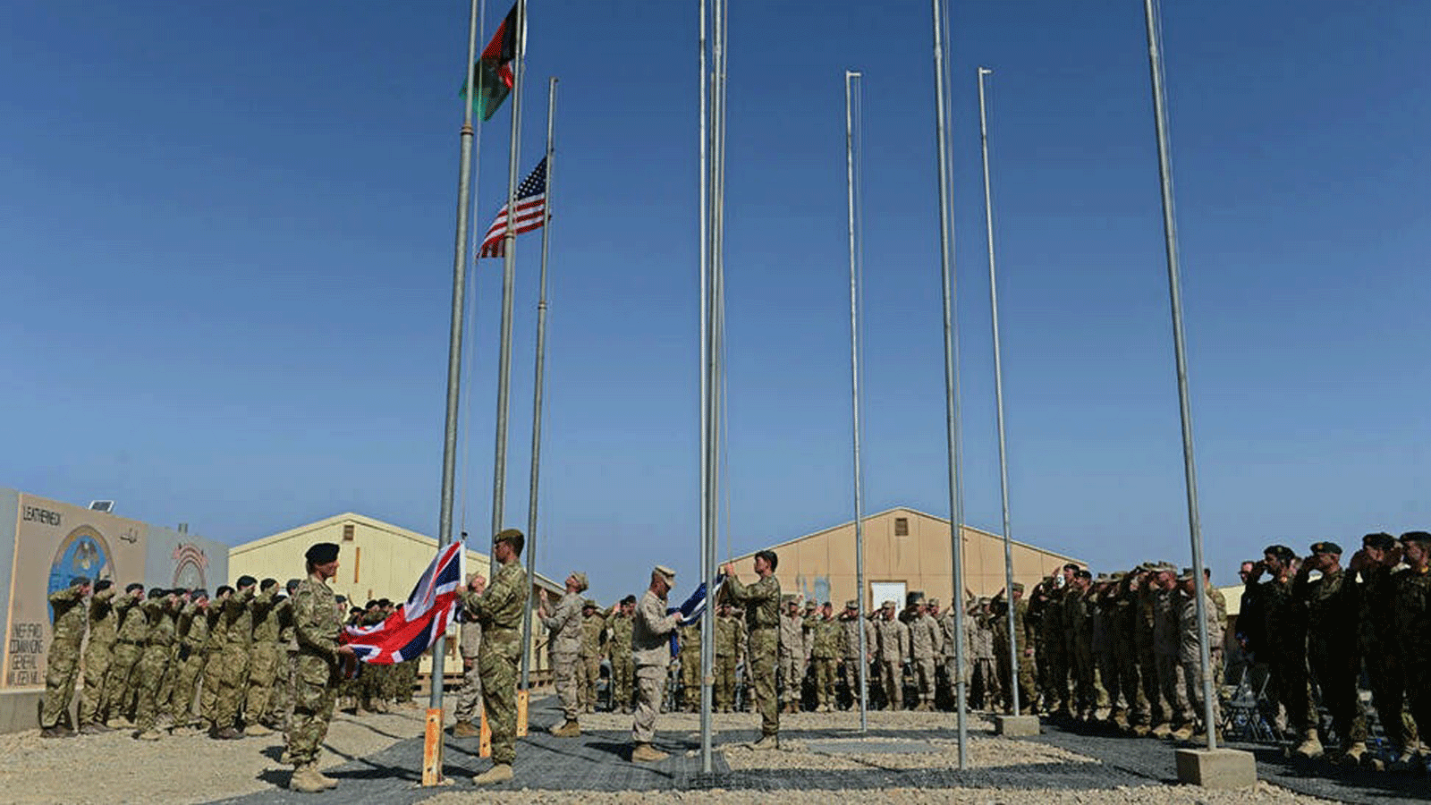 احتفال تسليم معسكر باستيون ومعسكر ليذرنيك في ولاية هلمند بأفغانستان