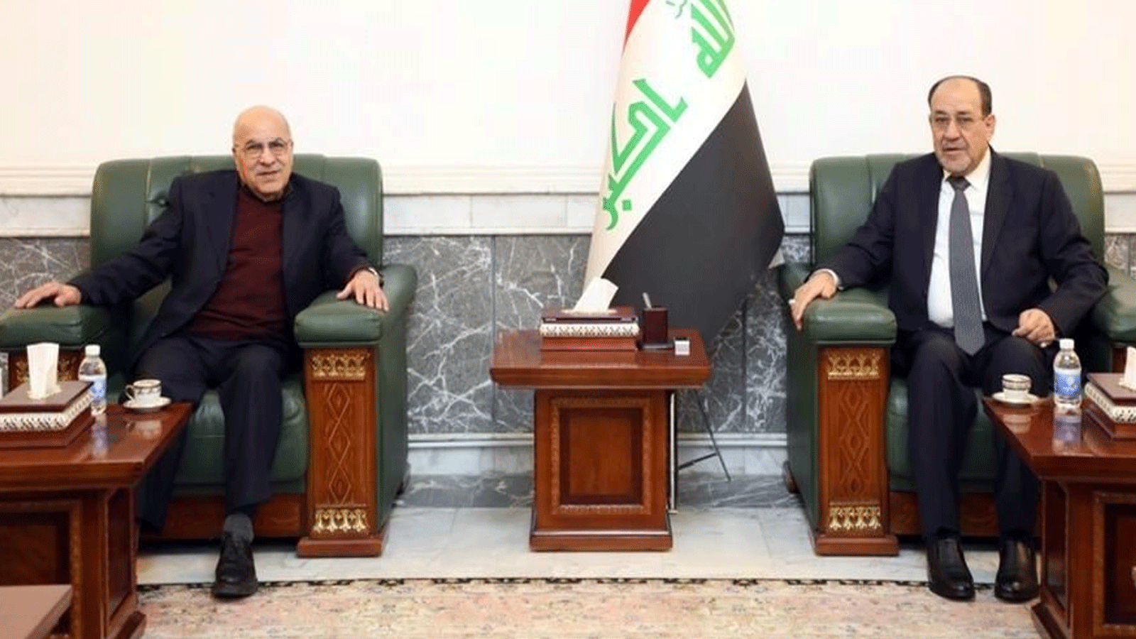 الشيخ راضي خلال اجتماعه في بغداد الشهر الماضي مع المالكي (خاص)
