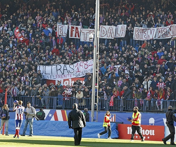 Real Madrid supporters shout slogans as they gather in Lisbon, Saturday, May 24, 2014, prior to the Champions League final soccer match between Spanish soccer teams Real Madrid and Atletico Madrid. (AP Photo/Francisco Seco)