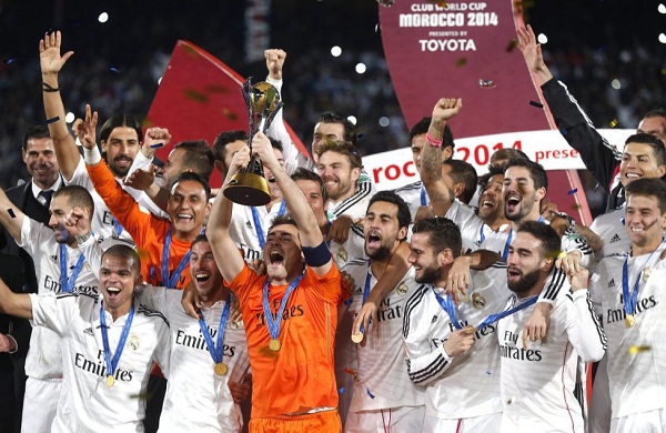 Real Madrid players celebrate winning the Champion League title at the end of the Champions League final soccer match between Atletico Madrid and Real Madrid in Lisbon, Portugal, Saturday, May 24, 2014. Real Madrid won 4-1