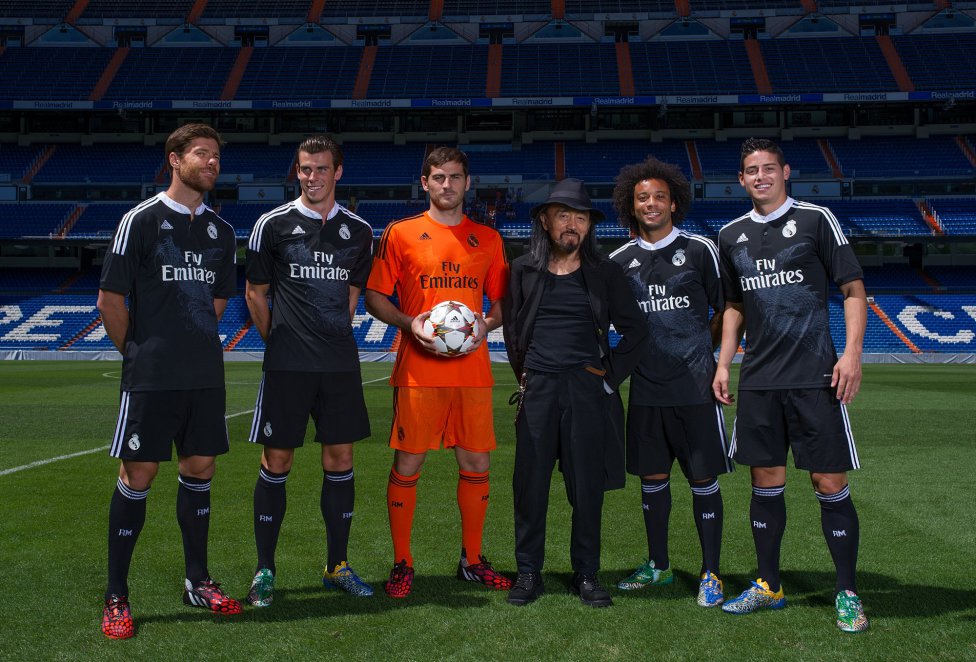 Real Madrid players pose for a photo, ahead of the start of the Champions League final soccer match between Atletico Madrid and Real Madrid, at the Luz stadium, in Lisbon, Portugal, Saturday, May 24, 2014