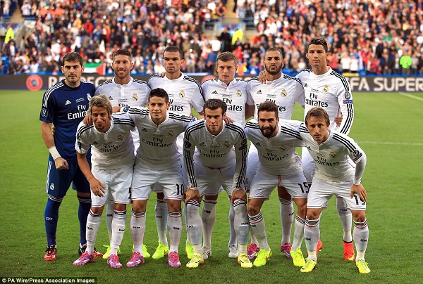 Real Madrid players pose for a photo, ahead of the start of the Champions League final soccer match between Atletico Madrid and Real Madrid, at the Luz stadium, in Lisbon, Portugal, Saturday, May 24, 2014