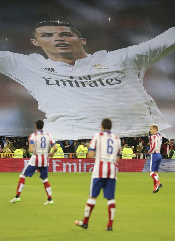 Real Madrid players pose for a photo, ahead of the start of the Champions League final soccer match between Atletico Madrid and Real Madrid, at the Luz stadium, in Lisbon, Portugal, Saturday, May 24, 2014