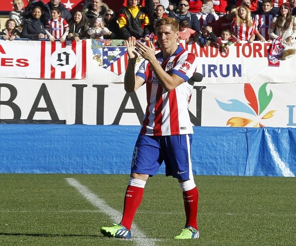 Real Madrid supporters gesture, prior to the Champions League final soccer match between Atletico Madrid and Real Madrid in downtown Lisbon, Portugal, Saturday, May 24, 2014. (AP Photo/Andres Kudacki)