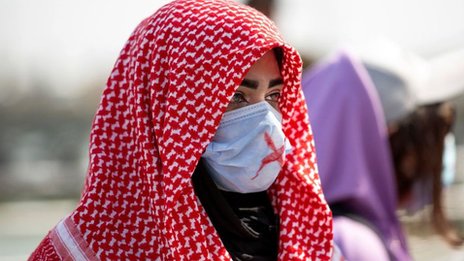 Getty Images متظاهرة عراقية يوم المرأة العالمي 2021