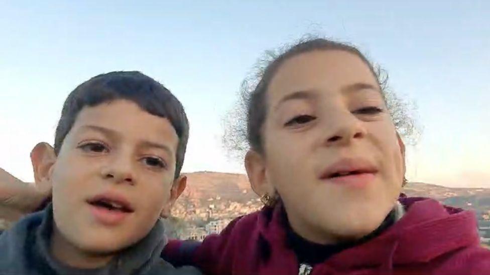 HANDOUT سجل عمرو وشقيقته سماح فيديو في الربيع من منزلهما في بورين بالضفة الغربية.