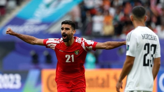 اللاعب الأردني نزار الرشدان يحتفل بتسجيله هدفاً في المرمى العراقي في 29 كانون الثاني (يناير) 2024 في الدوحة