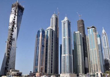 أراضي دبي تتعهد بوقف الزيادات غير القانونية