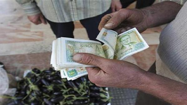 انخفاض سعر صرف الليرة السورية مقابل الدولار 6 %