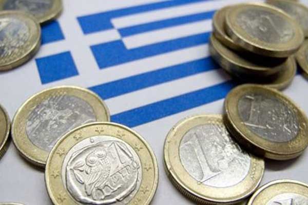 اليونان تتوصل إلى اتفاق أولي مع دائنيها