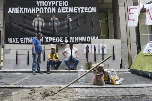 اتفاق على استئناف خطة إنقاذ اليونان بمشاركة صندوق النقد الدولي