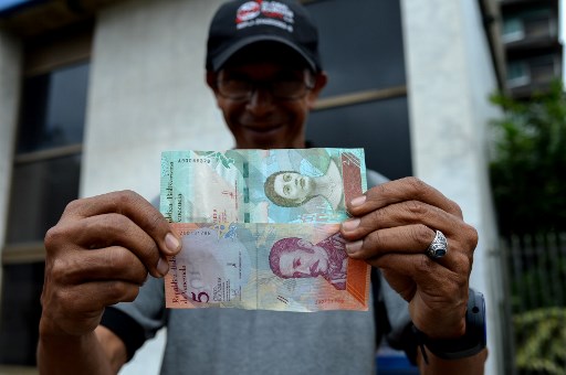 فنزويلا تخفض قيمة عملتها بنسبة 96% بموجب سعر صرف جديد