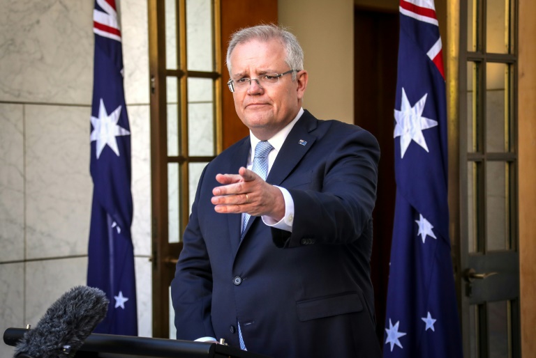 رئيس الوزراء الأسترالي سكوت موريسون خلال مؤتمر صحافي في كانبيرا في 22 مارس 2020
