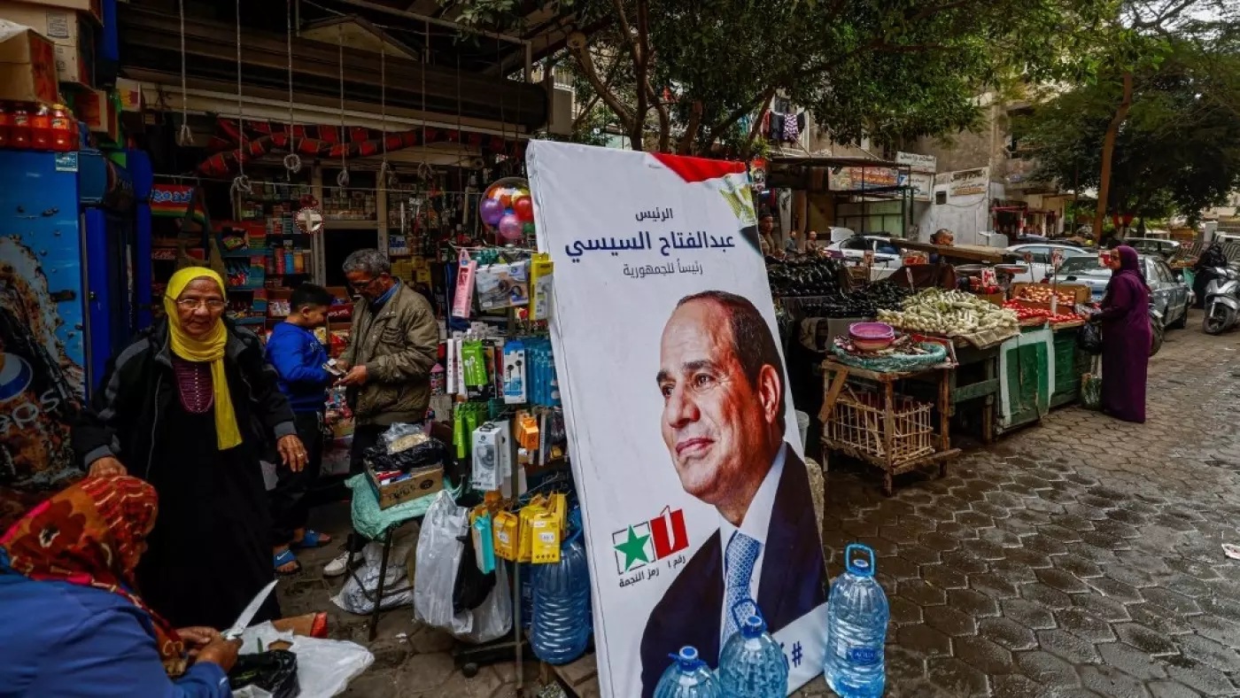 ملصق للرئيس المصري في سوق بالقاهرة، ديسمبر الماضي