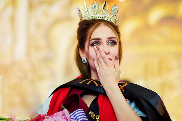 ملكة جمال العراق تُوضِح ملابسات تجريدها من اللقب