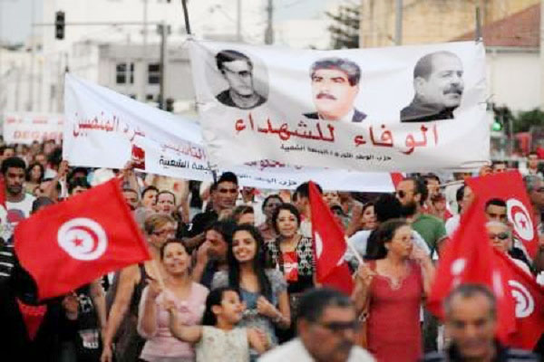 تونسيون يواصلون الضغط من أجل كشف حقيقة اغتيال محمد براهمي وشكري بلعيد