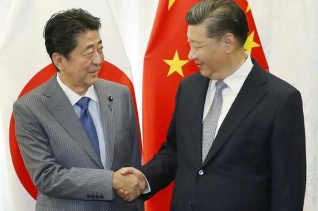 شينزو آبي في الصين مع عودة الدفء إلى العلاقات