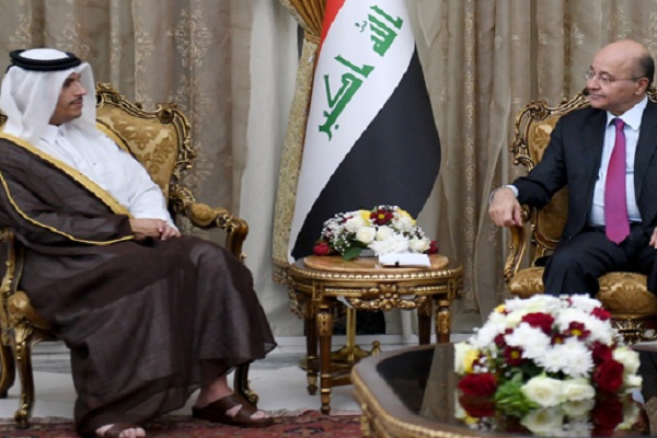 وزير خارجية قطر مجتمعا مع الرئيس العراقي برهم صالح