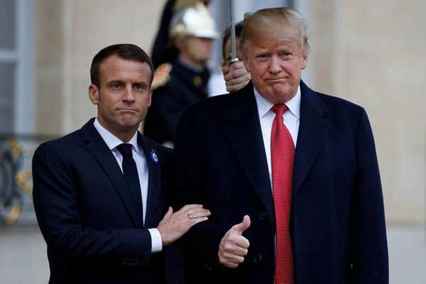 الرئيسان الأميركي والفرنسي - أرشيفية