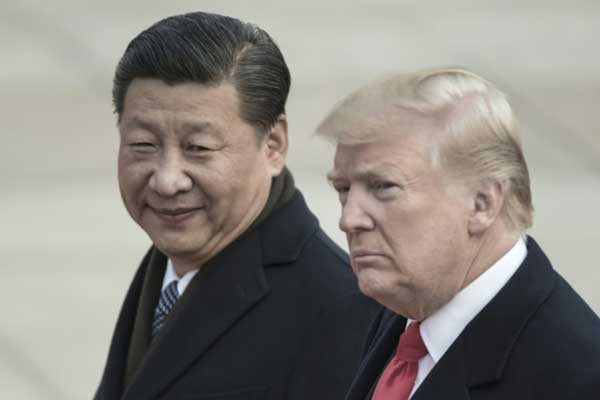 الرئيس الأميركي دونالد ترمب ونظيره الصيني شي جينبينغ في بكين بتاريخ 9 نوفمبر 2018