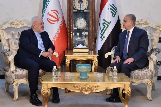 وزيرا الخارجية العراقي ونظيره الايراني خلال اجتماعهما في بغداد