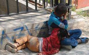 أطفال متسولون في أحد شوارع بغداد
