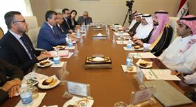 فريقا التنسيق للمجلس التنسيقي العراقي السعودي خلال اجتماعهما في بغداد