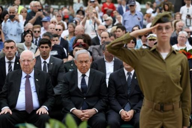 رئيس وزراء إسرائيل بنيامين نتانياهو والرئيس رؤوفين ريفلين خلال حفل إحياء ذكرى المحرقة في القدس في 2 أيار/مايو 2019