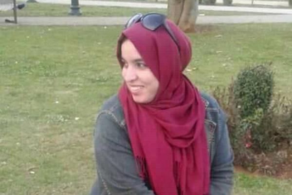 إيمان الغريس كما هرت في صورة منشورة مع الحوار