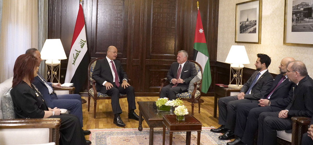 الرئيس العراقي والعاهل الاردني خلال اجتماعهما في عمان