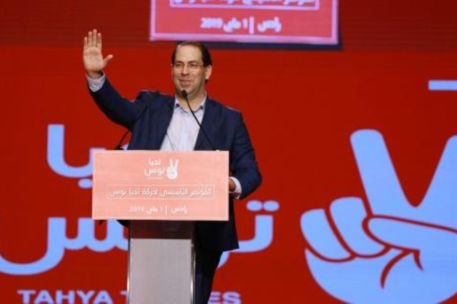 رئيس الوزراء التونسي يوسف الشاهد متحدثا في ضاحية تونس في الاول من مايو 2019