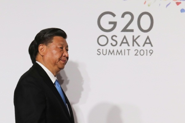 الرئيس الصيني شي جينبينغ خلال جلسة التقاط الصورة التذكارية في قمة مجموعة العشرين في أوساكا باليابان في 28 يونيو 2019