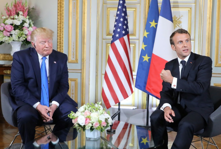 الرئيسان الاميركي دونالد ترمب والفرنسي ايمانويل ماكرون في 6 حزيران/يونيو 2019 في كاين (فرنسا)