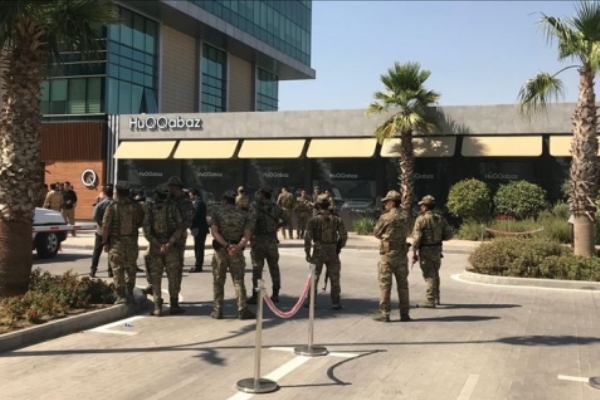 قوات كردية تحيط بالمطعم الذي شهد الهجوم على موظفي القنصلية التركي في أربيل