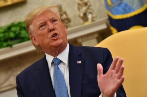 الرئيس الأميركي دونالد ترمب في المكتب البيضاوي بالبيت الأبيض في 22 يوليو 2019