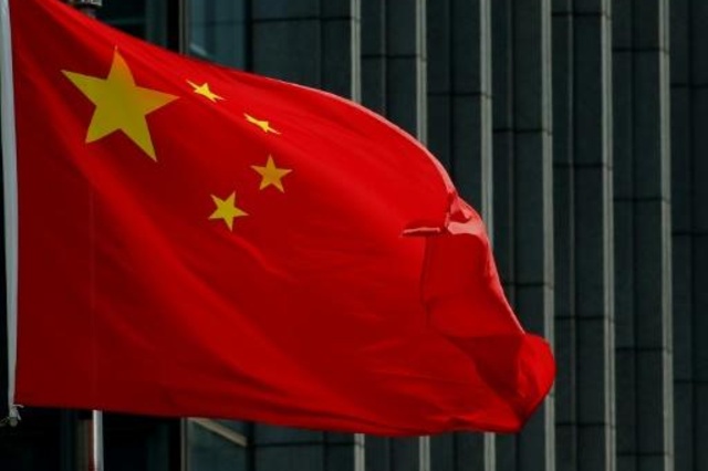 العلم الصيني يرفرف في بكين في 8 آب/أغسطس 2016