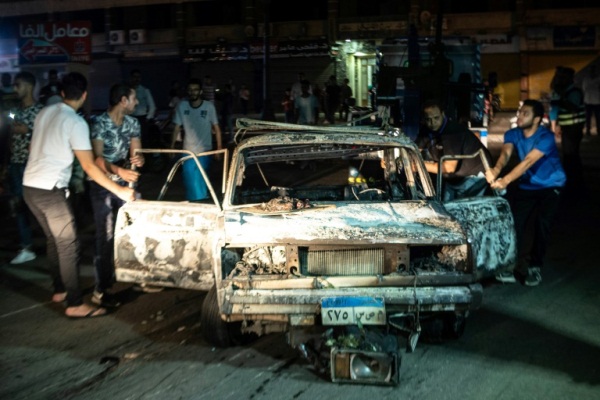 صورة التقطت في ساعة مبكرة الاثنين 5 أغسطس 2019 لسيارة متفحمة في أعقاب التفجير