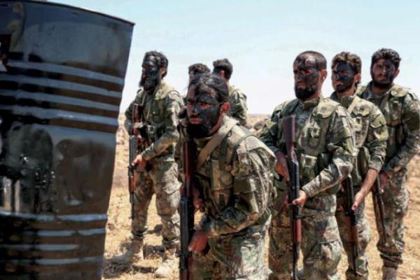 مقاتلون معارضون تدعمهم تركيا خلال تدريبات شمال حلب