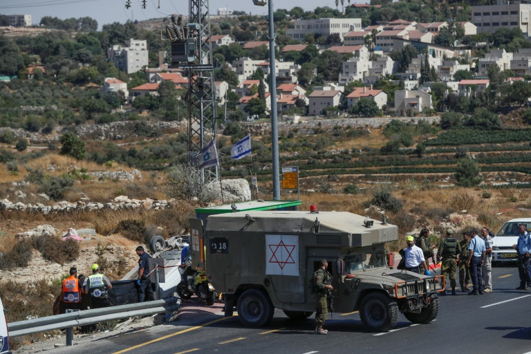 قوات الأمن الاسرائيلية في موقع عملية دهس بجنوب بيت لحم في الضفة الغربية المحتلة في 16 آب/أغسطس 2019