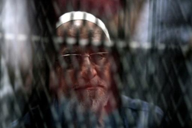 المرشد العام لجماعة الإخوان المسلمين اثناء جلسة محاكمته في مجمع محاكم في سجن طرة في جنوب القاهرة في 11 ايلول/سبتمبر 2019.
