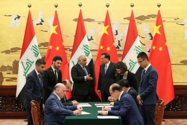 رئيس الوزراء الصيني لي كه تشيانغ ورئيس الوزراء العراقي عادل عبد المهدي في بكين