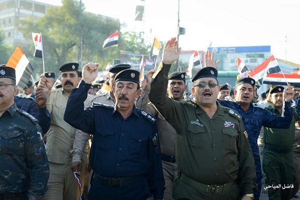 ضباط شرطة كربلاء في تظاهرة دعمًا لمطالب المتظاهرين - الوكالة العراقية للانباء