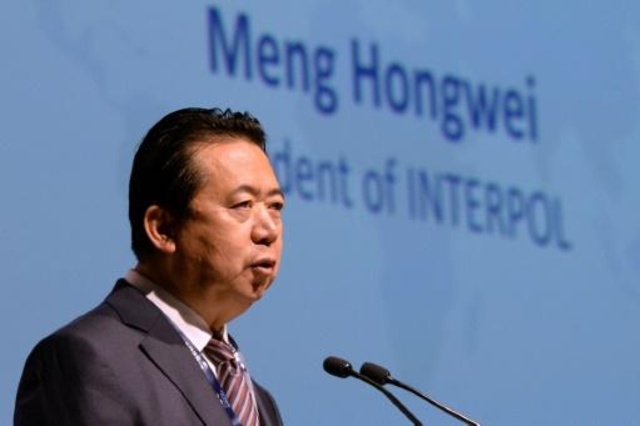 مينغ هونغوي، في 4 تموز/يوليو 2017 لدى افتتاح مؤتمر الانتربول في سنغافورا.
