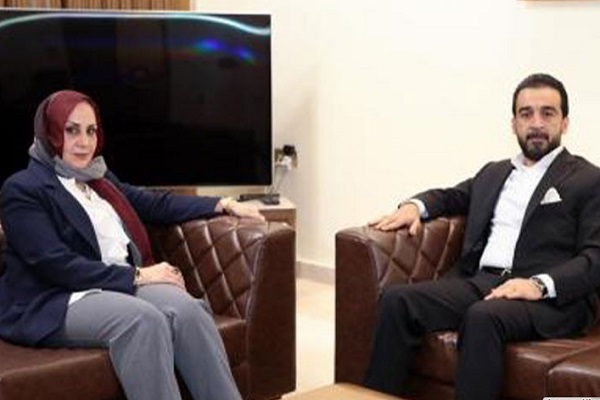 سهى العلي خلال لقاء مع رئيس البرلمان محمد الحلبوسي